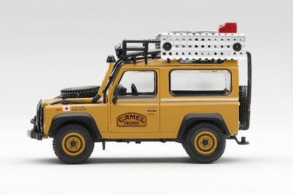 【2026年11月以降発売予定】 MINI GT MGT01307-L 1/64 ランドローバー ディフェンダー 90 キャメルトロフィー ボルネオ島  1985 チームジャパン(左ハンドル)