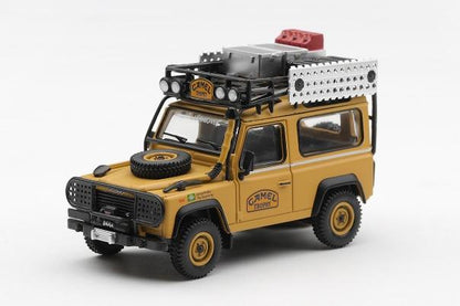 【2026年11月以降発売予定】 MINI GT MGT01308-L 1/64 ランドローバー ディフェンダー 90 キャメルトロフィー ボルネオ島  1985 チームブラジル(左ハンドル)
